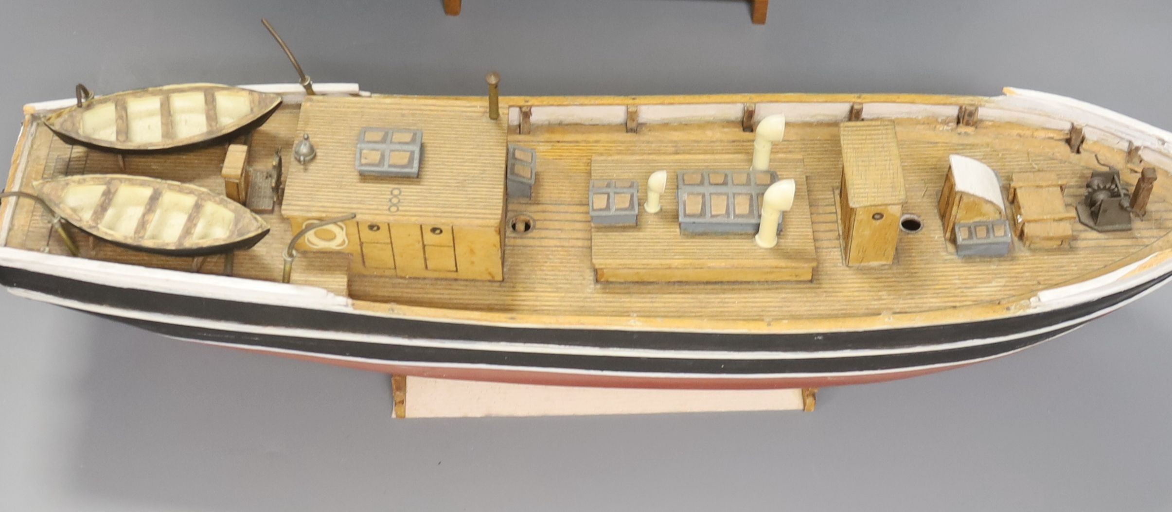 Two pond yachts and a model of a ship, longest 51.5 cm